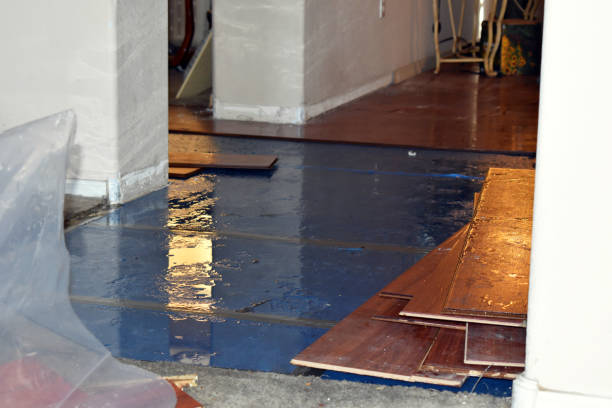 Professional Water Damage Restoration technician working in Corning, NY